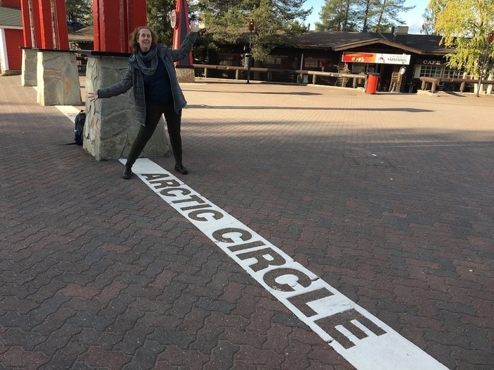 standing on the arctic circle in lapland.