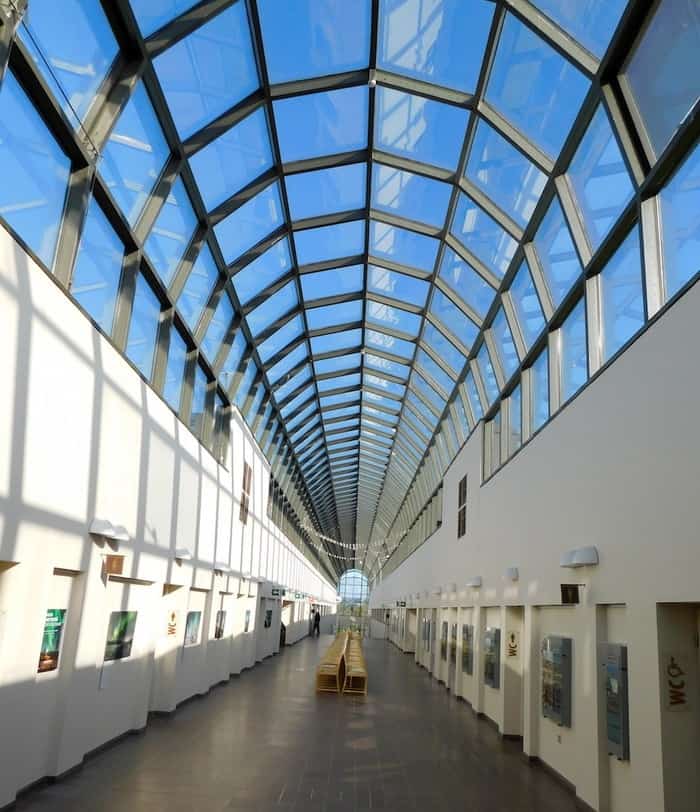 The long sunlit hallway of the arktikum museum in rovaniemi