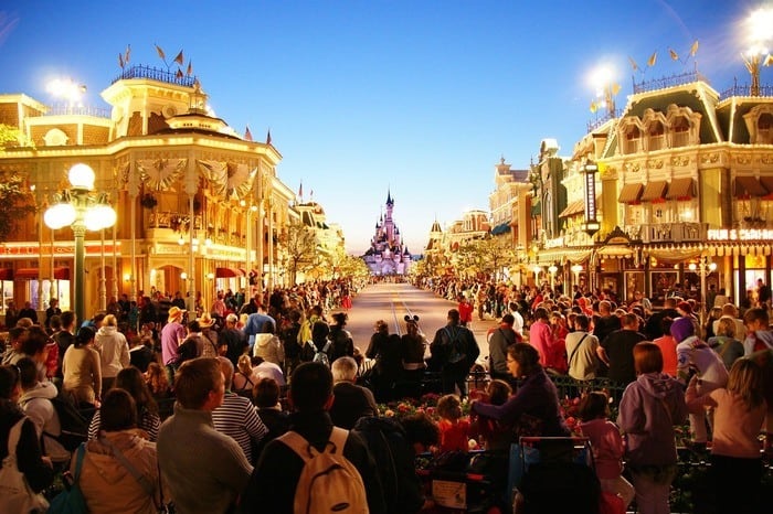 Disney parades draw crowds and often leave the rides empty.