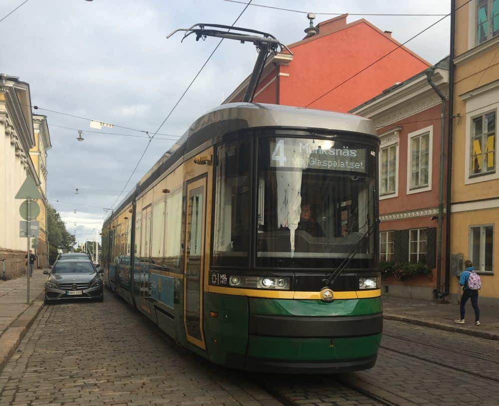 A street tram heads towards helsinki's senate square.