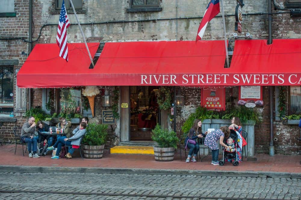 River street sweets is a popular family stop on this touristy savannah street. Look for the red awning.