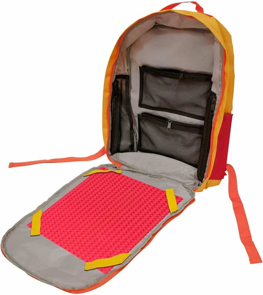 This backpack was made for carrying lego bricks and building on the go. It opens up to provide a sturdy dotted base for building anywhere.