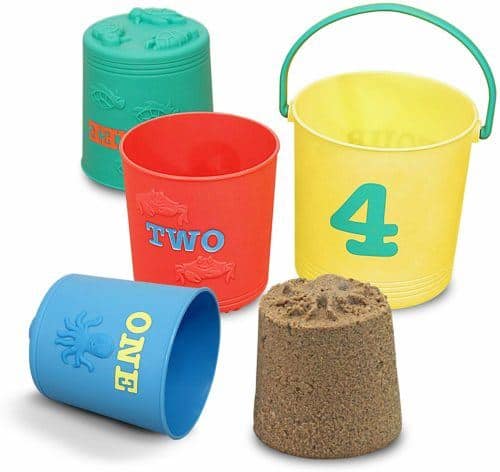 Nesting pails from melissa & doug fit easily in a suitcase and have 4 different molds.