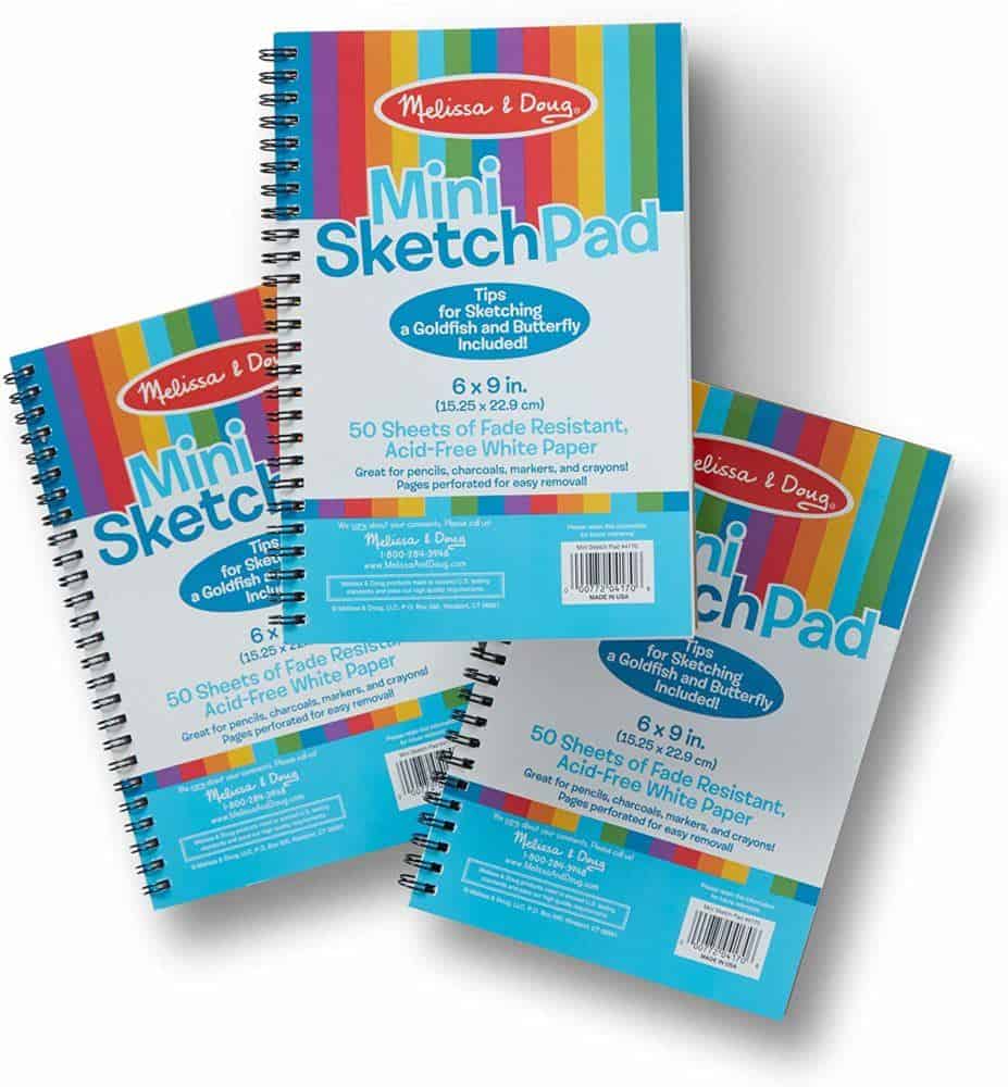 Arts & crafts are a lifesaver then you travel with kids, so pack supplies like these mini sketch pads.