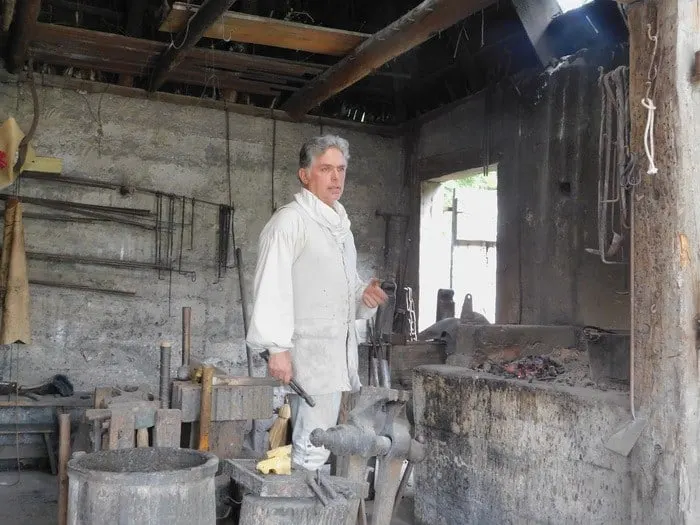 Exploring St. Augustine With Kids A volunteer does a blacksmithing demonstration in the colonial quarter