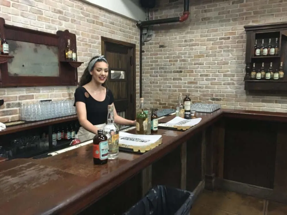 tour guide and bartender on the distillery tour.