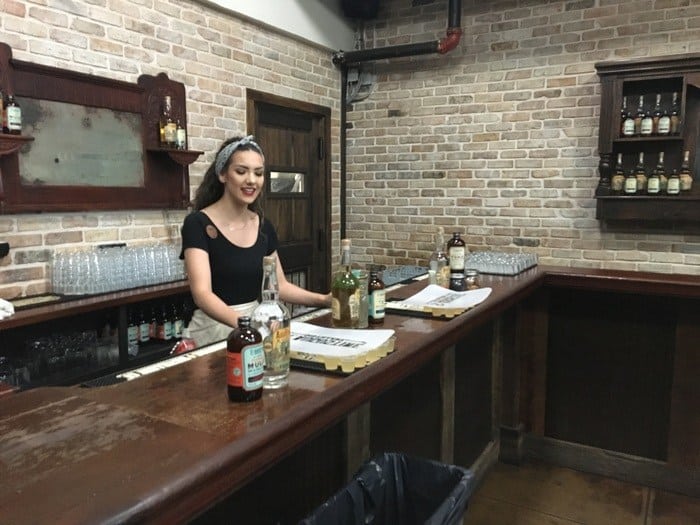 Tour guide and bartender on the distillery tour.