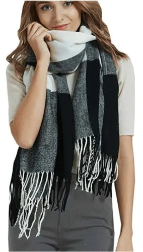 a large warm scarf like this black and white one can come in very handy when you're traveling.