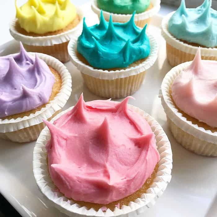 One girl cupcakes with bright icing