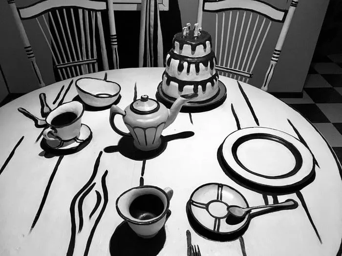 walk into a black and white cartoon set for tea in santa fe's meow wolf