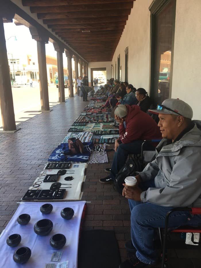 new mexico indian artisands outside of the palace of governors.