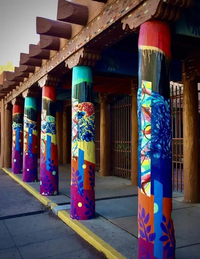 colorful pillars outside the art museum in santa fe's old town.