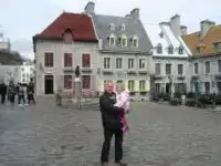father and daughter in quebec's lower old town.