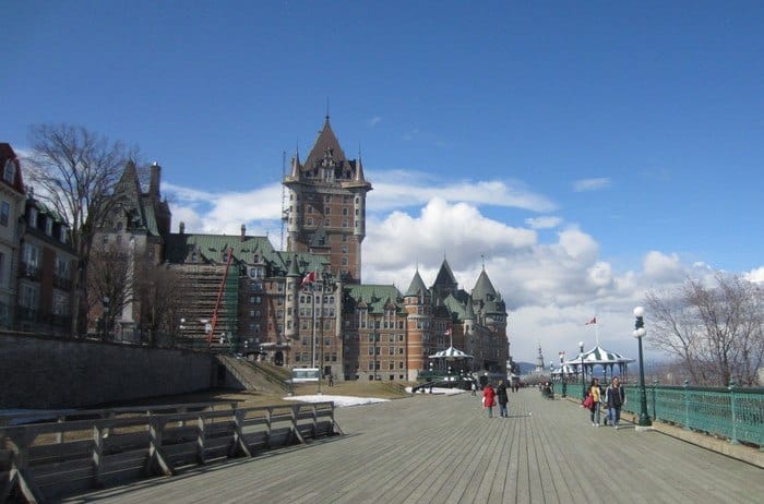 the boardwalk in quebec's upper old town with the chateau frontenac in the background.