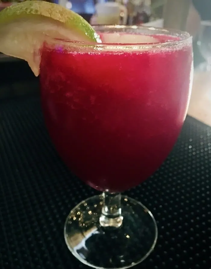 a pink prickly pear margarita at the shed