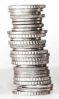 a pile of coins ready for the laundromat washing machine