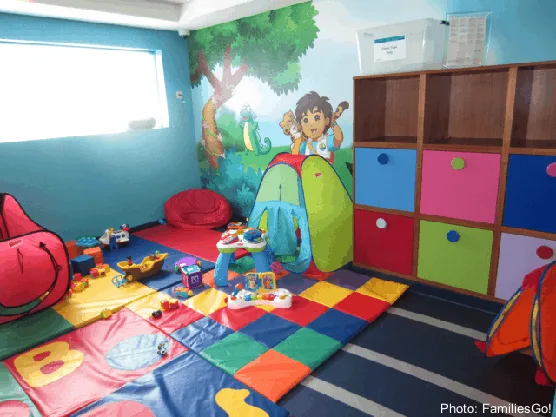 play areas like this dora-the-explorer themed room on ncl make it easier to cruise with a baby or toddler. 