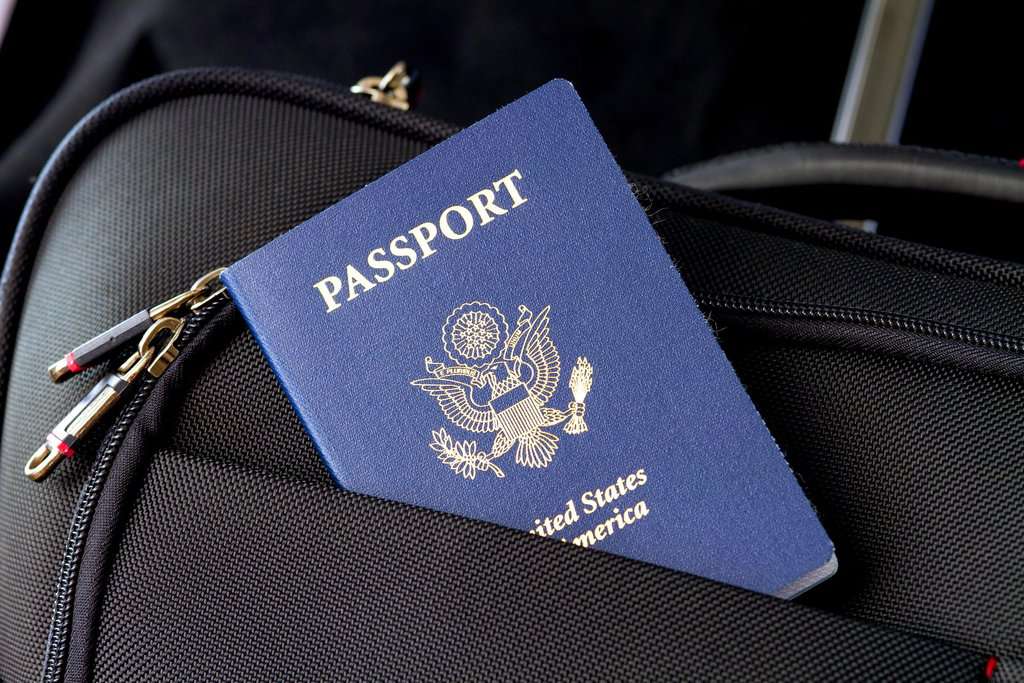 Passport in a luggage pocket. Keep your passport safe when you travel.
