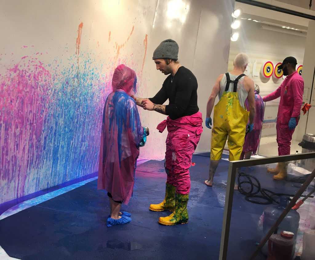 Slime just keeps pouring on my head. A sticky shower at sloomoo.