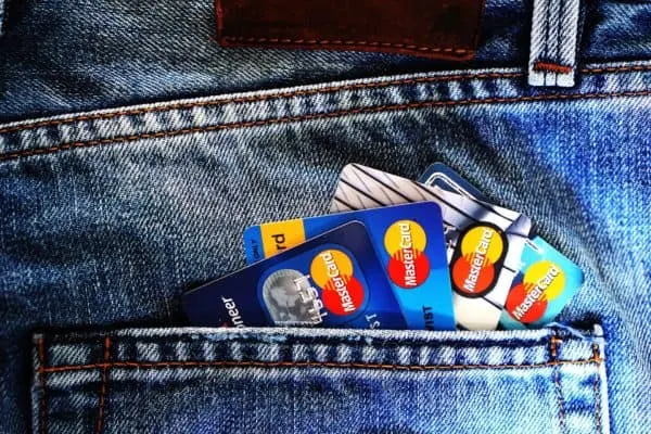 a pocket full of credit cards. which is best for saving for a vacation?