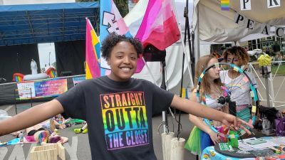 A teen enjoys being out at the denver pride