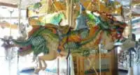 share a dragon with a wizard at the lark toy store carousel