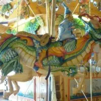share a dragon with a wizard at the Lark Toy Store carousel