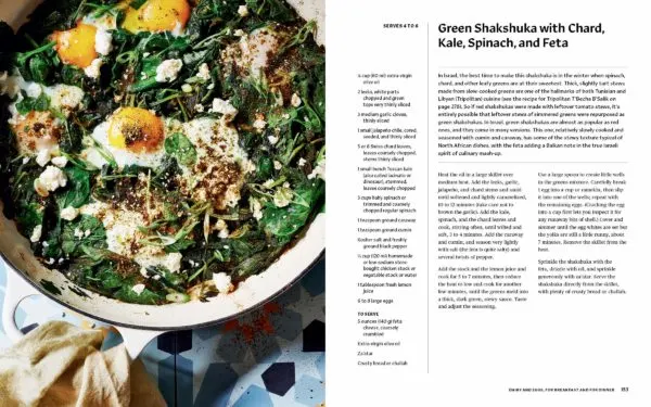photo and recipe of green shakshuka with eggs poaches in it.