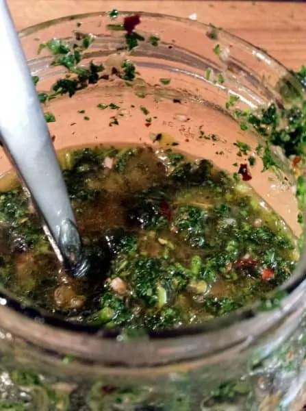 chimichurri is a vinegar and parsley sauce argentines love on steak.