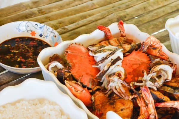 Grilling crabs and eating them outside is the best beach house dinner.