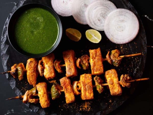 Paneer tikka us a fun cocktail snack or vegetarian barbecue dish.