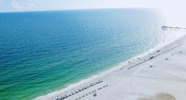 gulf shores has a long stretch of beach with good sand and calm water.