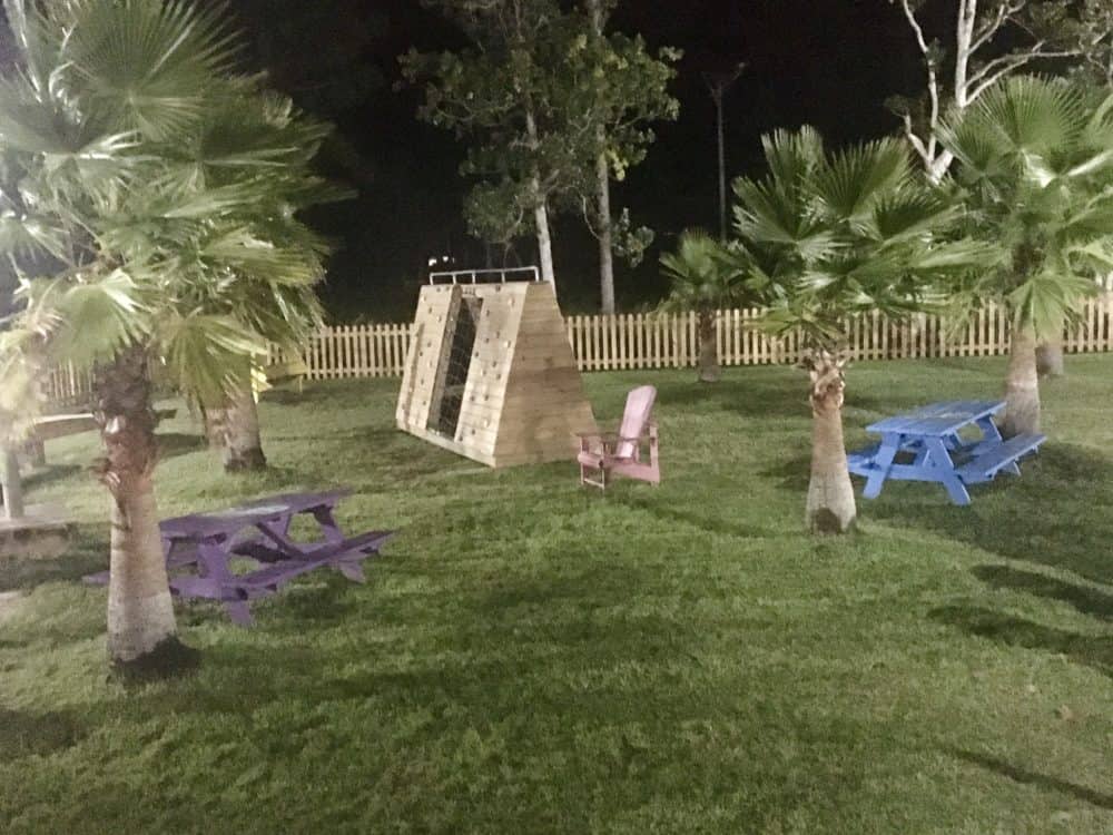 A climbing wall and other fun outside at gts on the bay.