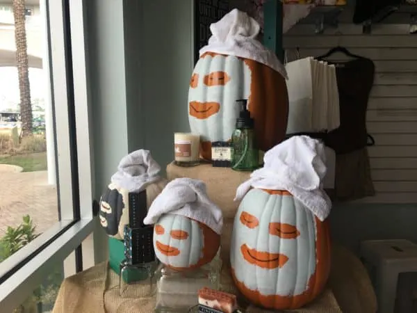 Take Your Kids To Gulf Shores, Al pumpkins in facial masks decorate high cottons windows in fall.