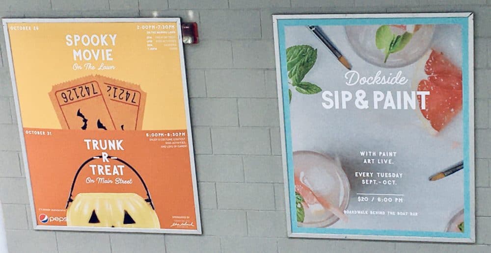 Posters announcing some of the special events at the wharf in orange beach, including halloween movies and dockside "sip & paint. "