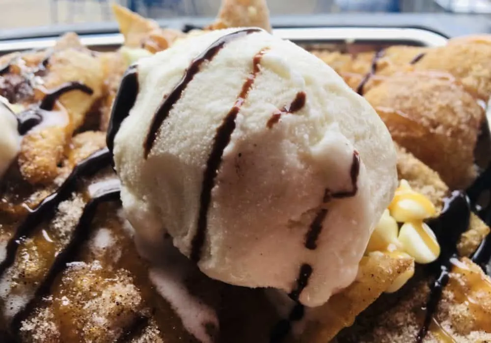 cinnamon-and-sugar dusted tortilla chips with vanilla ice cream, dessert at yoho tacos.