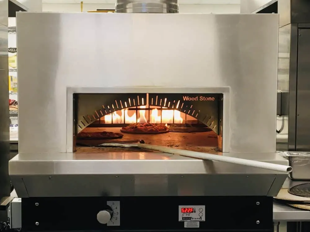 a brick oven for cooking pizza at the gulf coast zoo safari club