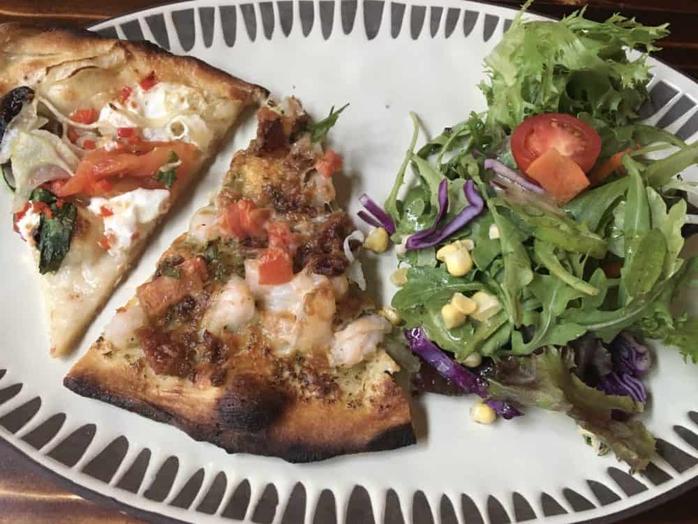 fresh brick oven pizza and salad at the gulf coast zoo's safari club restaurant/