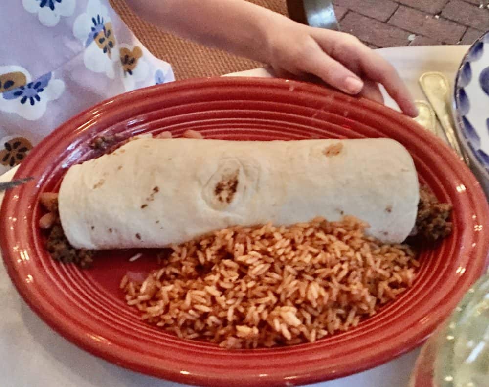 A kids' burrito plate with mexican rice at el pinto restaurant