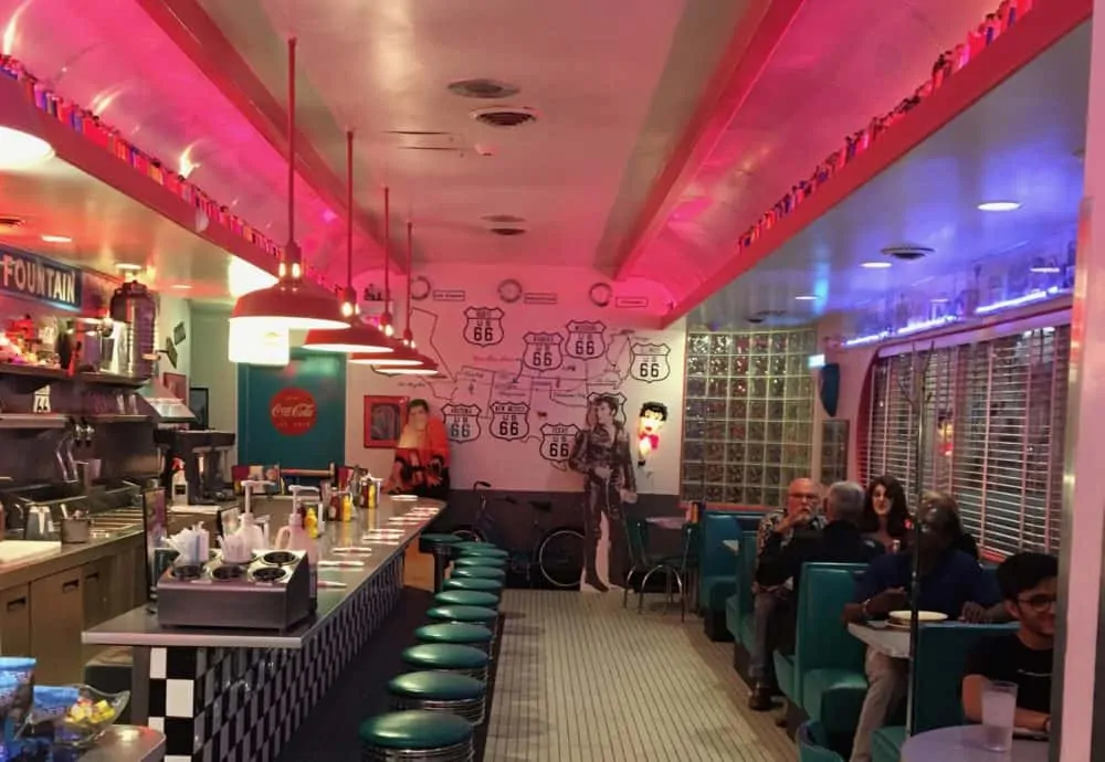 the classic counter and booths at the route 66 diner near the university of mexico