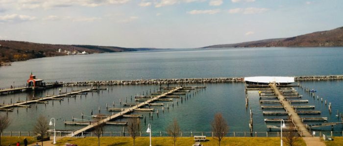 a view of the marina on seneca lake from the harbor hotel in the spring, before the boats have been put in the water.