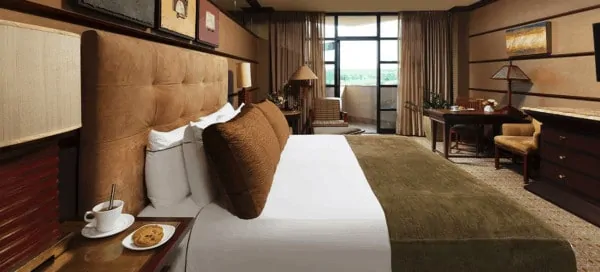 rooms at falling rock are frank lloyd wright inspired with their earthy colors and geometric patterns.
