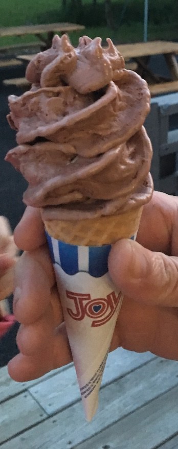 chocolate-walnut ice cream on a cone at cooper's barn ice cream shop