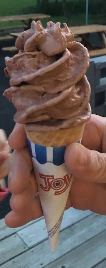 chocolate-walnut ice cream on a cone at cooper's barn ice cream shop