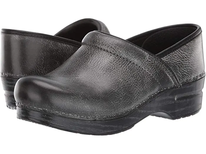 distressed black dansko professional clogs are a bootlike shoe for the fall. 