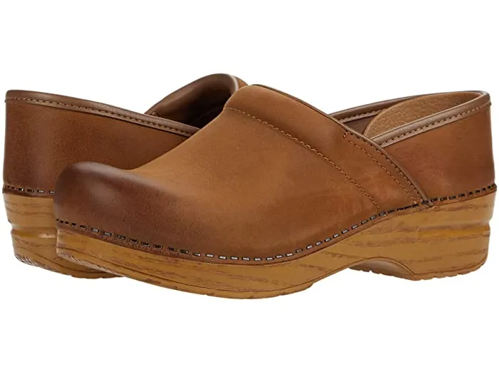 brown dansko professional clogs keep feet comfortable and look good with jeans when fall rolls around.
