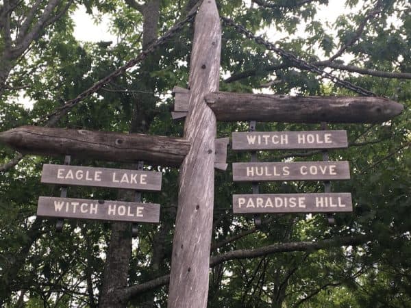 Wooden signs marking the roads on acadia' national park's carriage roads.