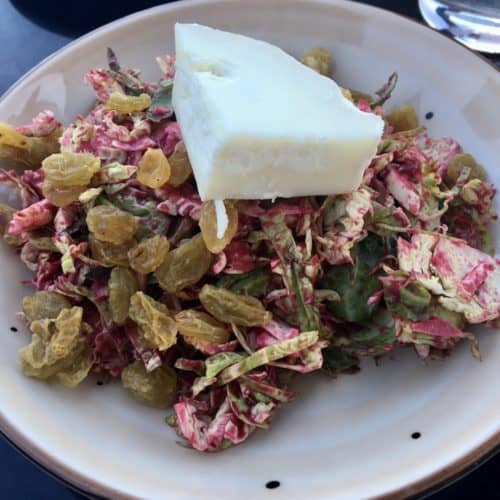 an-end-of-summer shaved brussels sprouts salad with local goat cheese at the tavern at diamond mills hotel