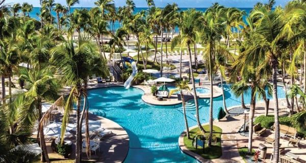 The hilton in ponce is a sprawling resort with family amenities like a large pool with a slide.