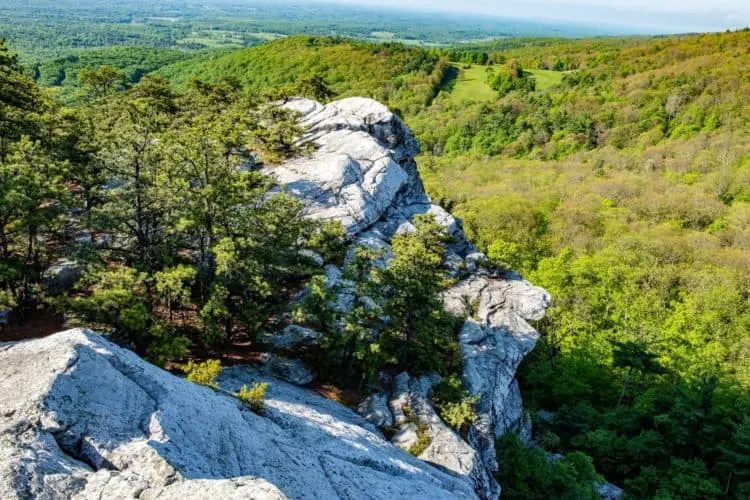 a view of hills and valleys from a peak of the shawangunks in the hudson valley